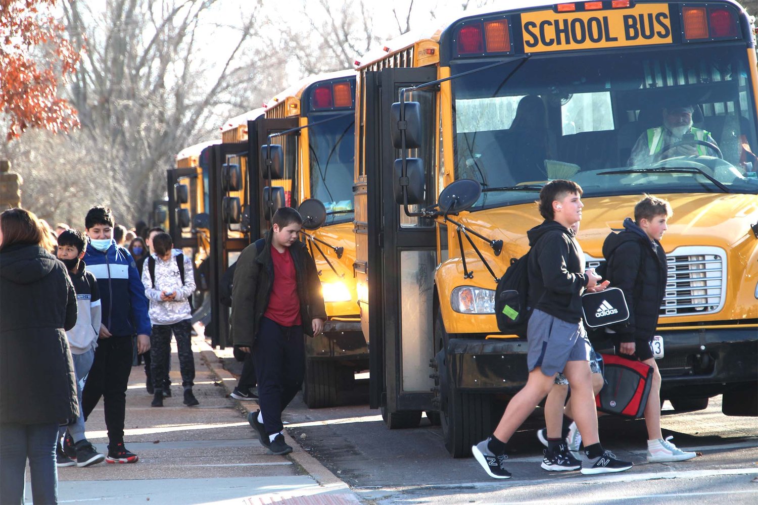 Students from Smith-Cotton Junior High School load onto buses Thursday afternoon. Sedalia School District 200 and First Student came up with a contingency plan to battle a driver shortage as they experienced on Jan. 7.